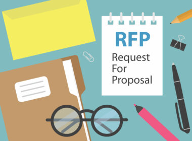a request for proposal on a desk
