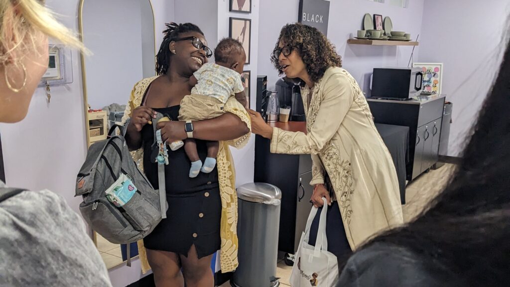 Congresswoman Sydney Kamlager-Dove (right) greets CinnaMoms and babies during Wednesday's Black breastfeeding week event. Photo by Heluna Health.